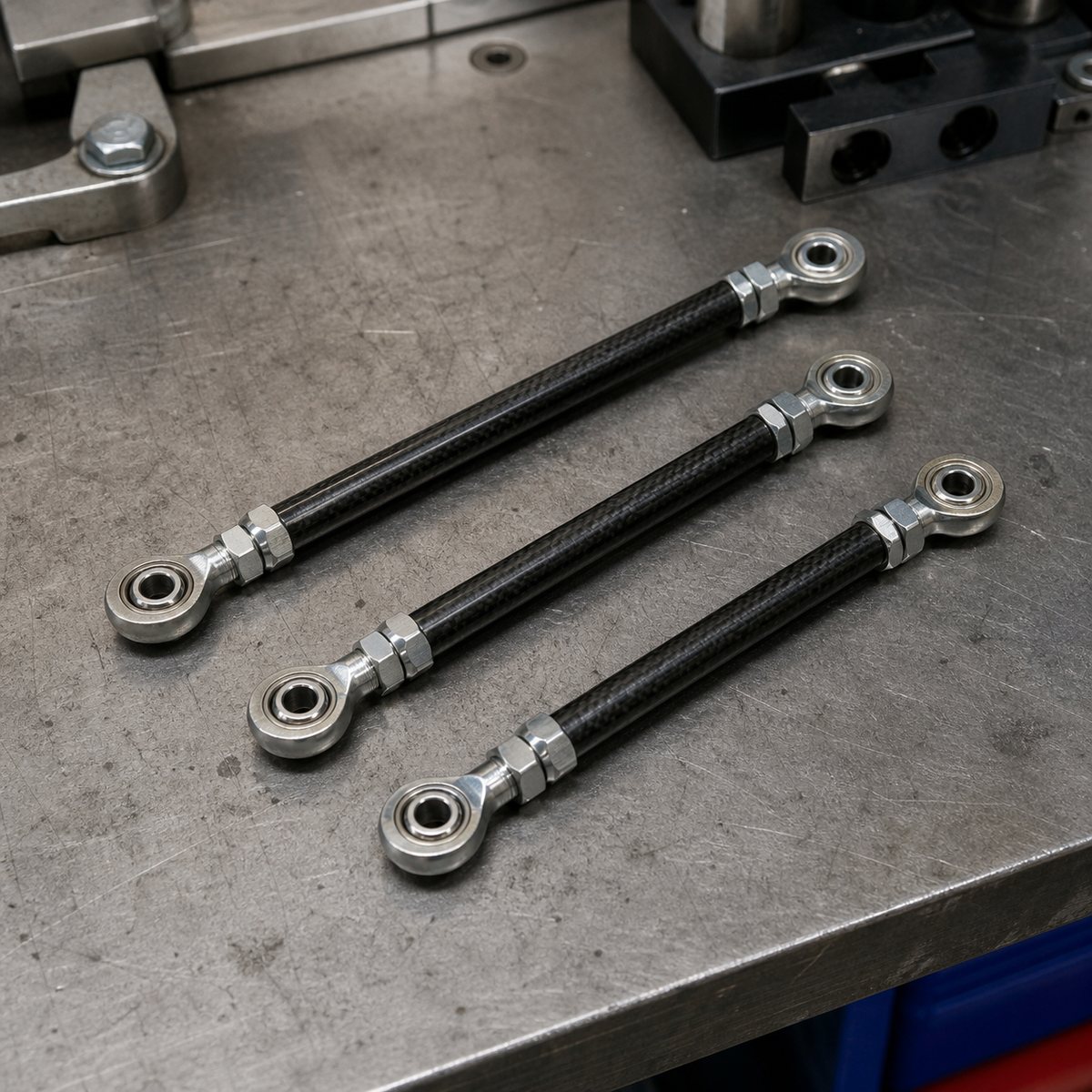 Adjustable carbon fiber linkage rods with left and right hand threaded ends